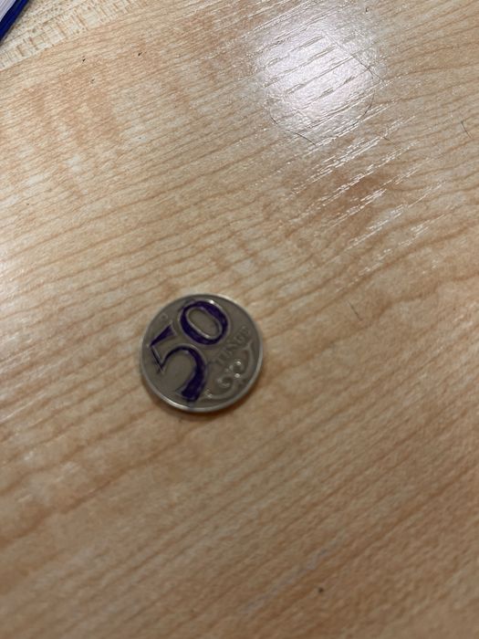 Продам монету 50 теньге