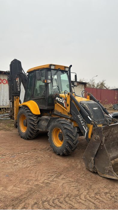 МСТ , MST  542 Plus Эксковатор-погрузчик