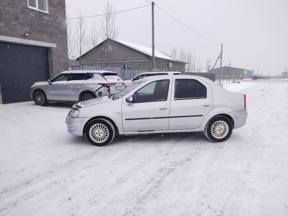 Автомобиль Рено Логан 1