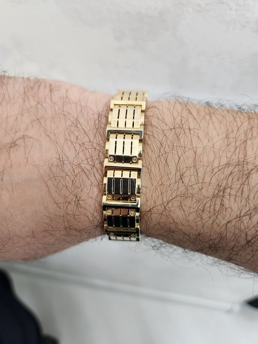 Золотой браслет в стиле Cartier