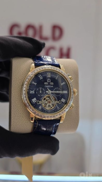 Продам золотые Омега с безумно красивым синим циферблатом