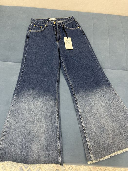 Новые джинсы женские