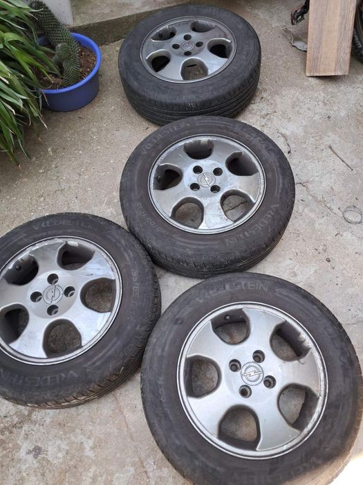 Гуми със джанти за Опел 15 ки