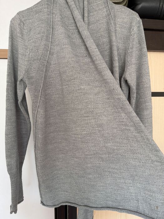 Colin's grey cardigan