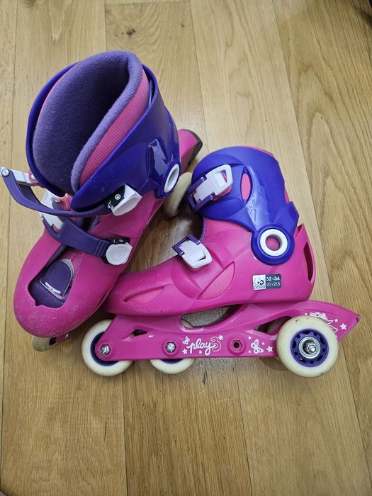 Роликовые коньки