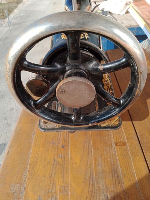 Mașină de cusut Singer