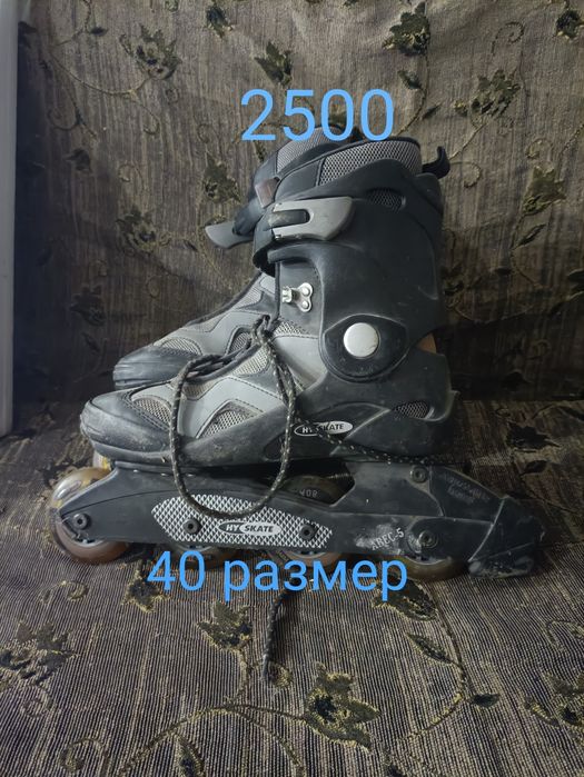 Роликовые коньки