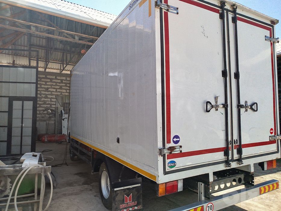 Isuzu avtobusdan terilgan mator karobka zadni moʻs avtobus 2007yil