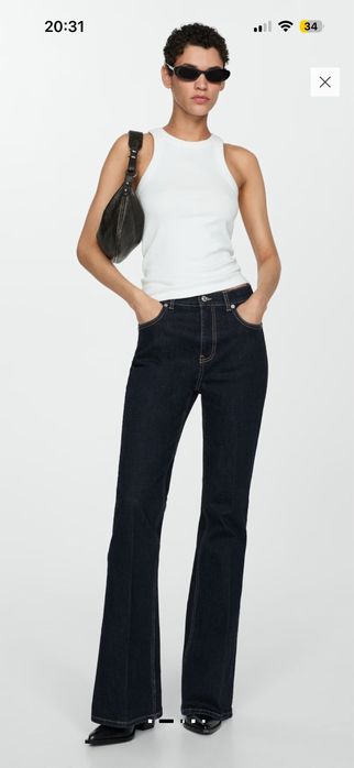 Нави дънки Mango flare и кожен панталон