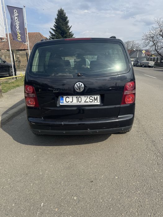 Vând touran DSG sau schimb