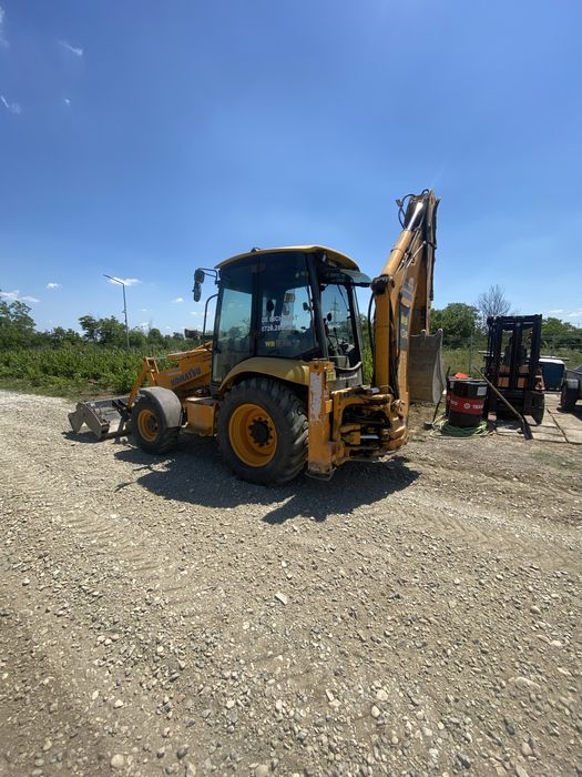 Vând buldoexcavator Komatzu