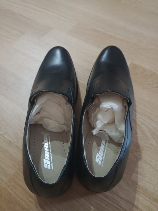 Продам новые кожаные туфли