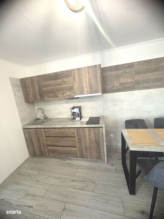 Apartament la casă, cu 4 camere