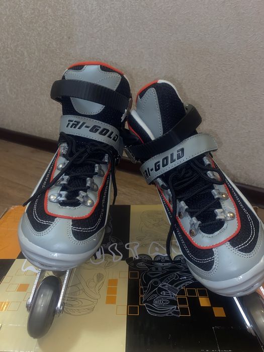 Роликовые коньки