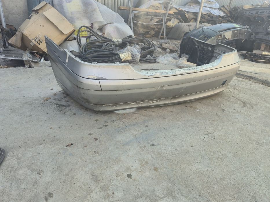 Задний бампер Mercedes W203 Седан