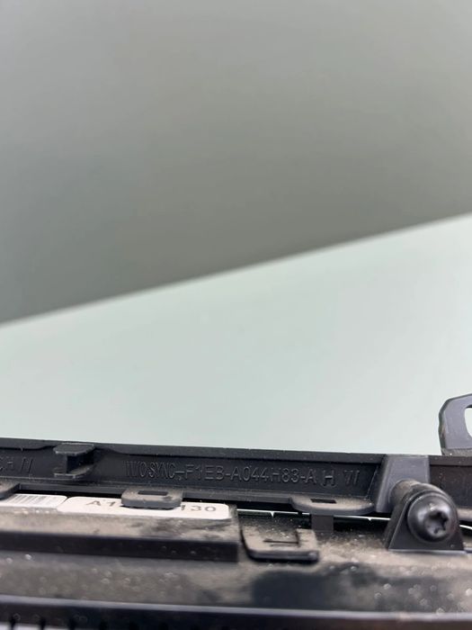 Consola centrala F1ET18C612DE / F1EBA044H83A Ford Focus