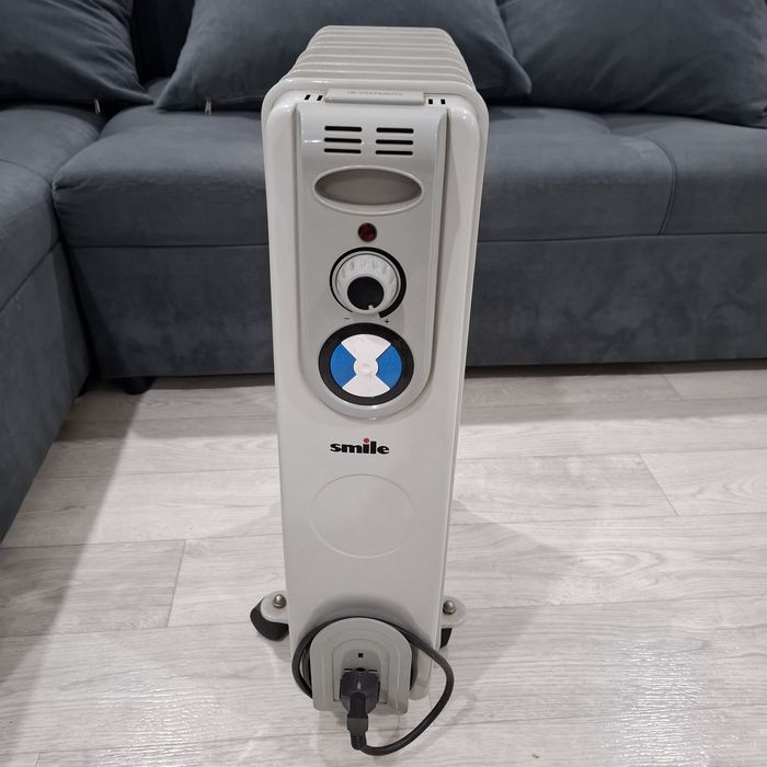 Масляный радиатор (обогреватель)