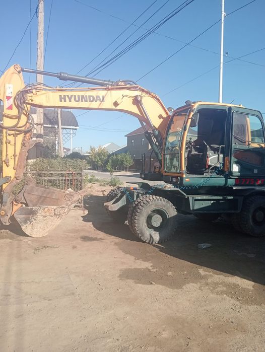 Экскаватор колесный хюндай