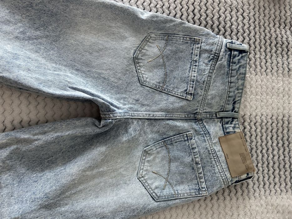 Рваные джинсы