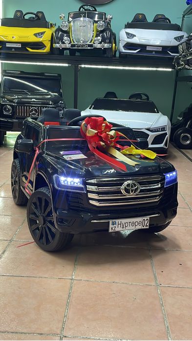 Жезказган Тойота крузак детская машина электромобиль