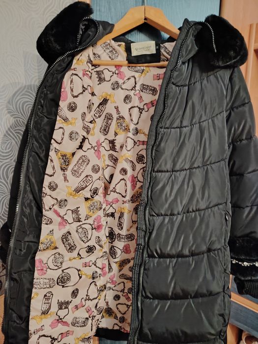 Продам пуховик женский