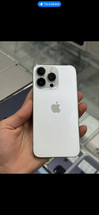 Iphoonee.  13 proooo white