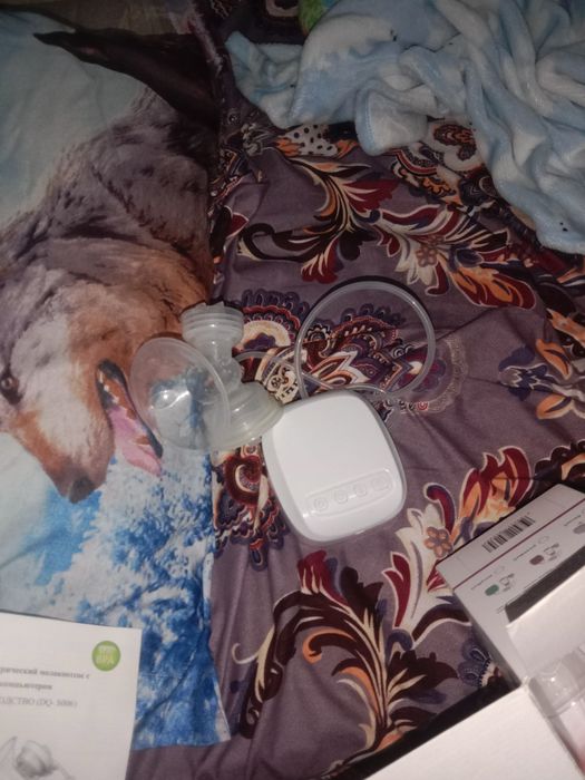 Продам молокоотсос электроный