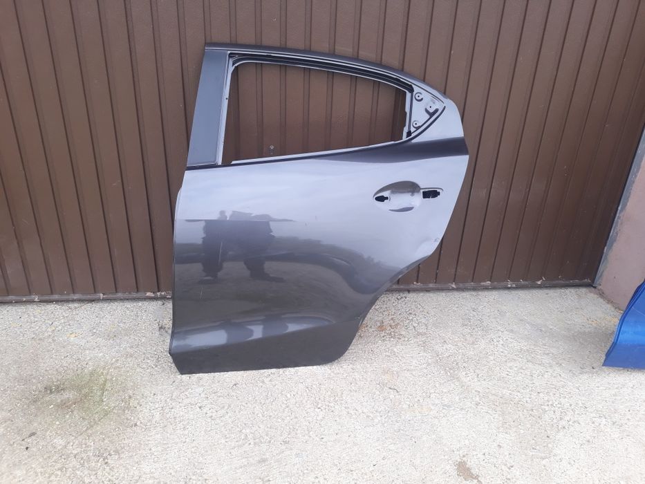 Usa stanga spate mazda 2