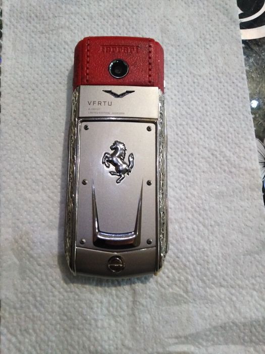Телефон вертy  ферари