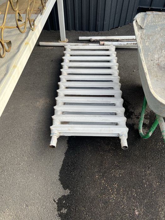 Батарей чугунные