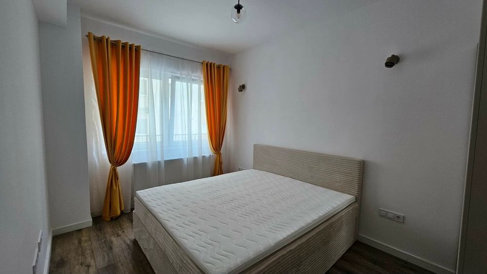 Proprietar,  închiriez apartament cu garaj subteran bloc  nou!