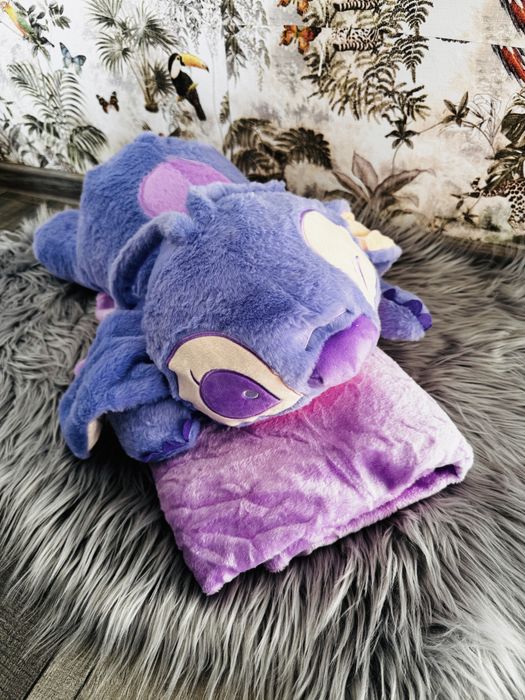 Ursulet plus stitch canta melodia desenului disney