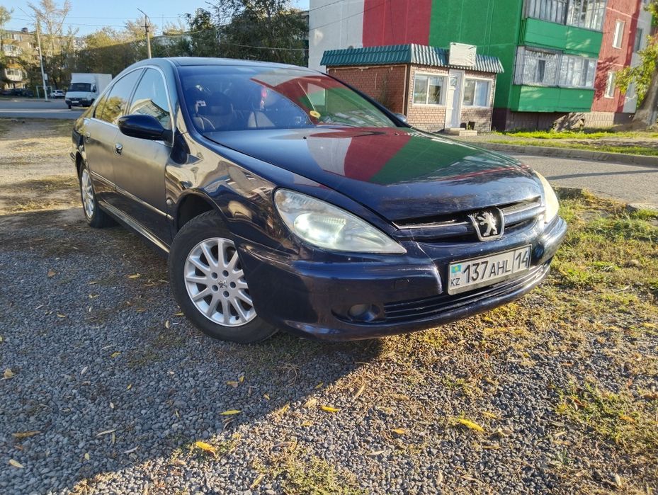 Пежо 607. Обём двигателя 2,2.