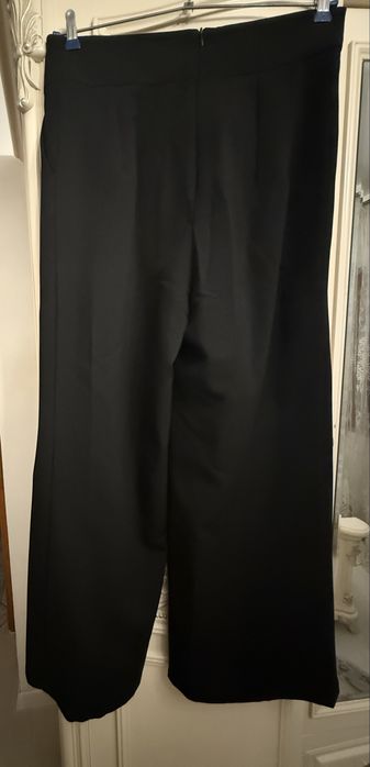 Pantaloni largi cu talie inalta