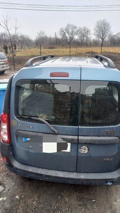 Vând  (sau schimb) LOGAN MCV 2009