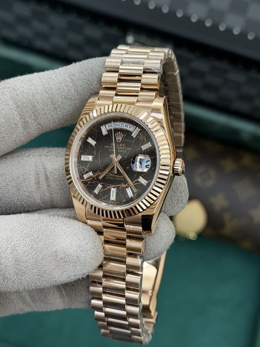 Rolex Day-Date 40 Baguette Eisenkiesel