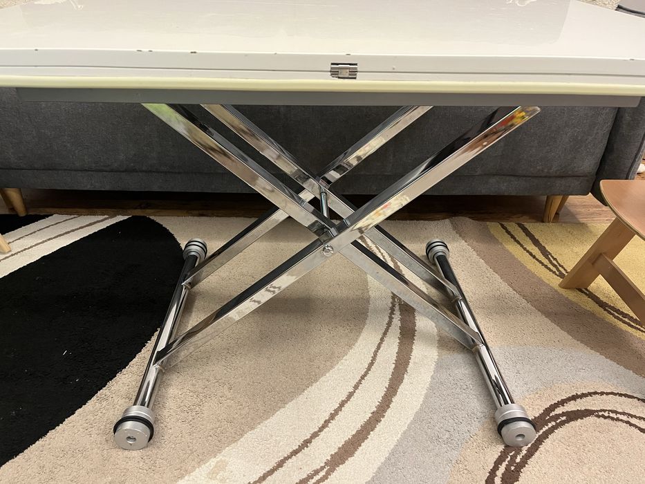 Разтегателна маса с повдигащ механизъм