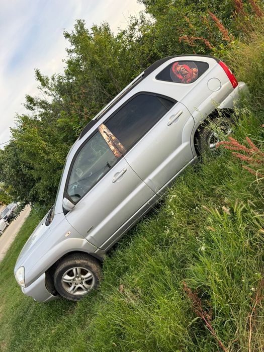 Vând  kia sportige