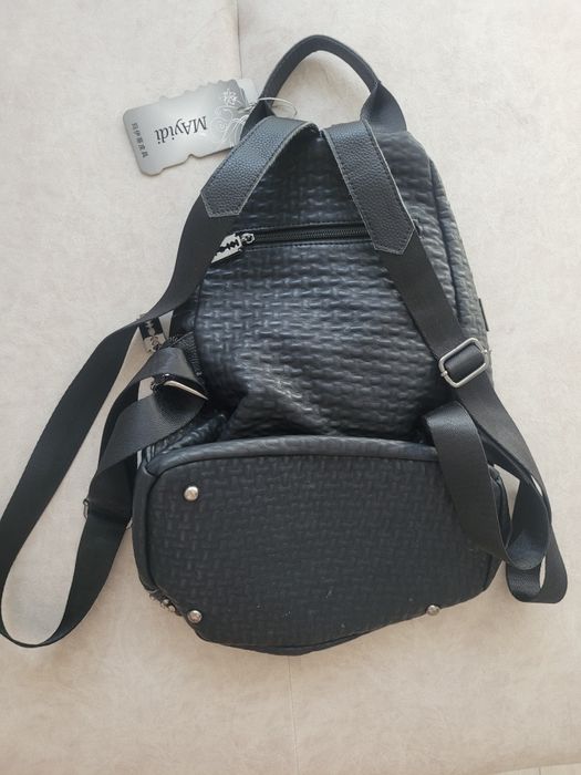 Новый кожаный рюкзак