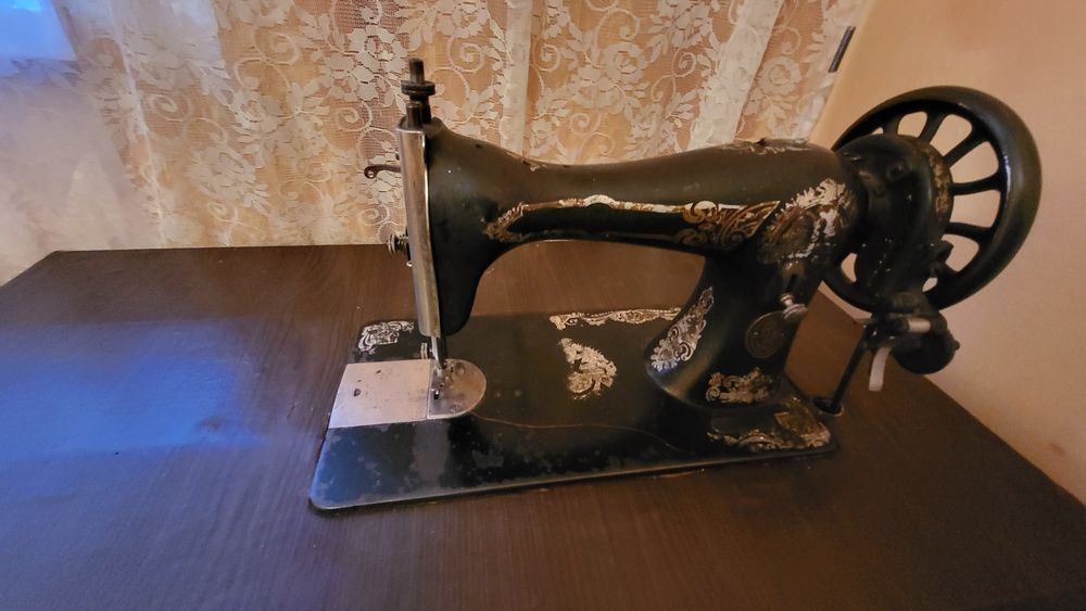 Mașina de cusut Singer
