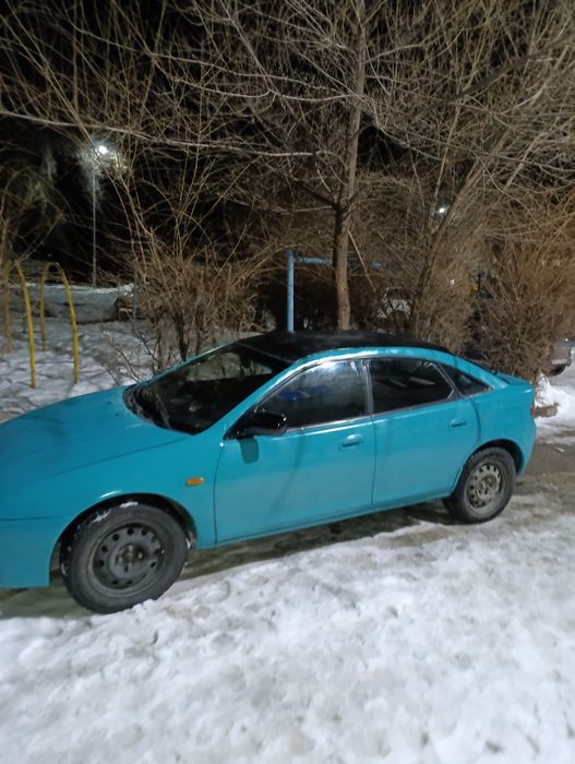 Автомобиль Мазда 323
