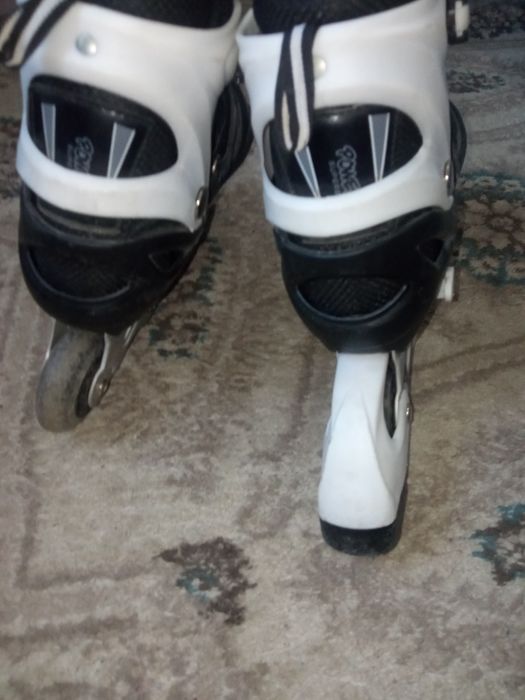 Роликовые коньки