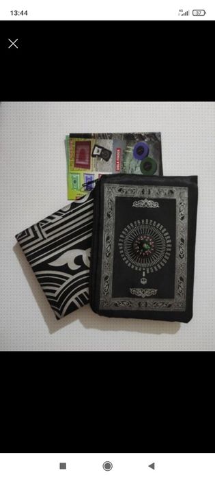 Новый компактный молитвенный коврик с компасом.