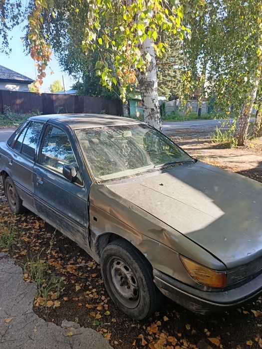 Продам Mitsubishi Lancer 1991год