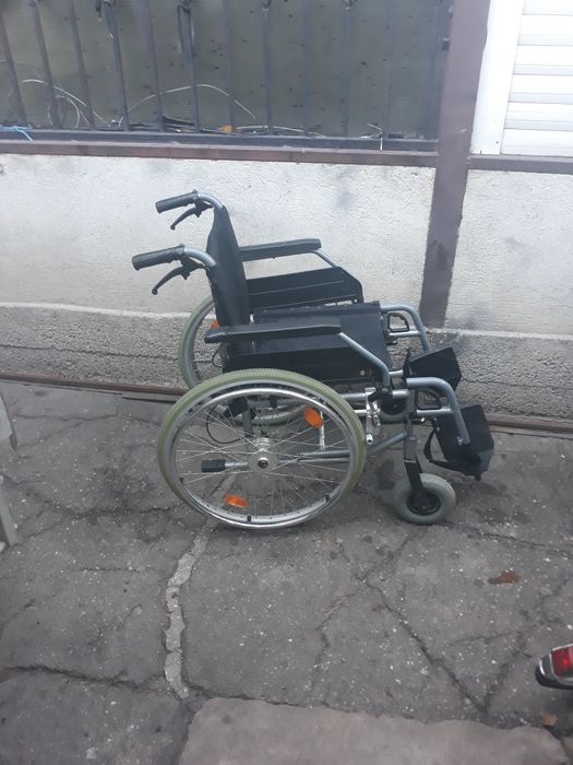 Carucior handicap  scaun cu rotle