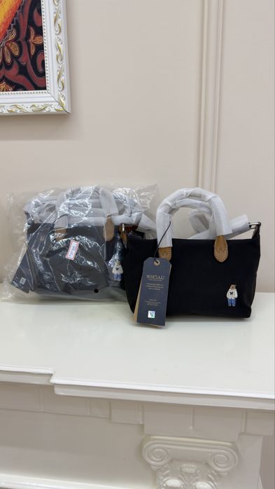 В наличии сумки от WHO.A.U