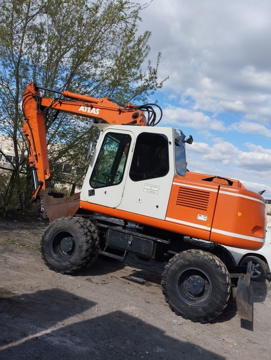 Колёсный экскаватор