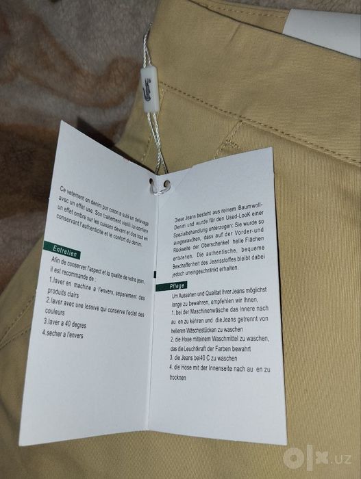 Продам шорты Lacoste в абсолютно новом состоянии и женский костюм
