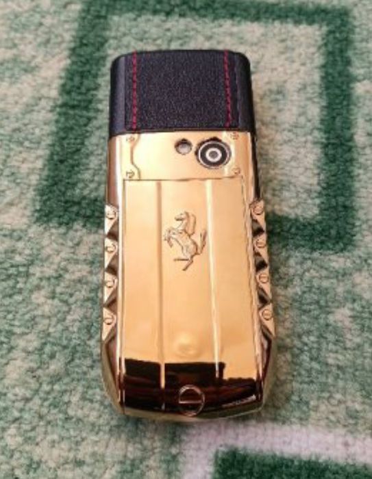 Мобилен телефон марка SERVO с две СИМ карти + кутия + зарядно - работи