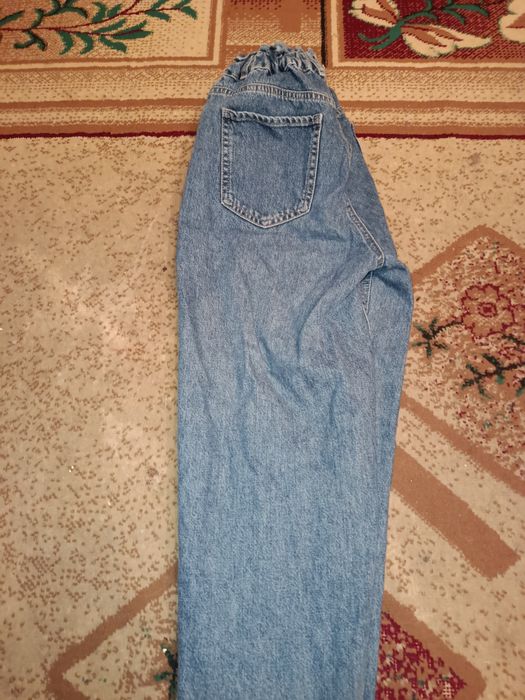 джинсы "бананы" синего цвета